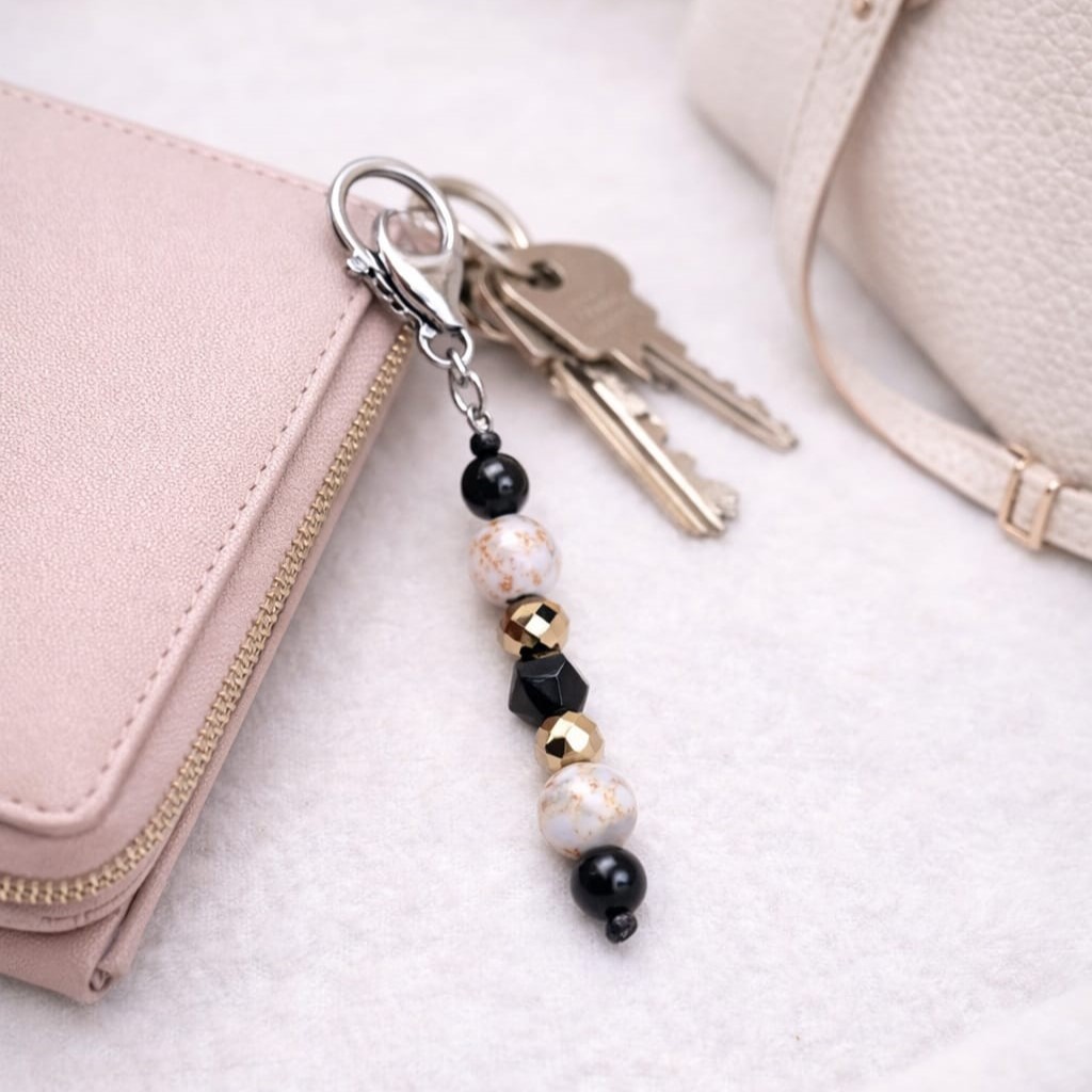 Zawieszka Brelok biało-złoty Howlit