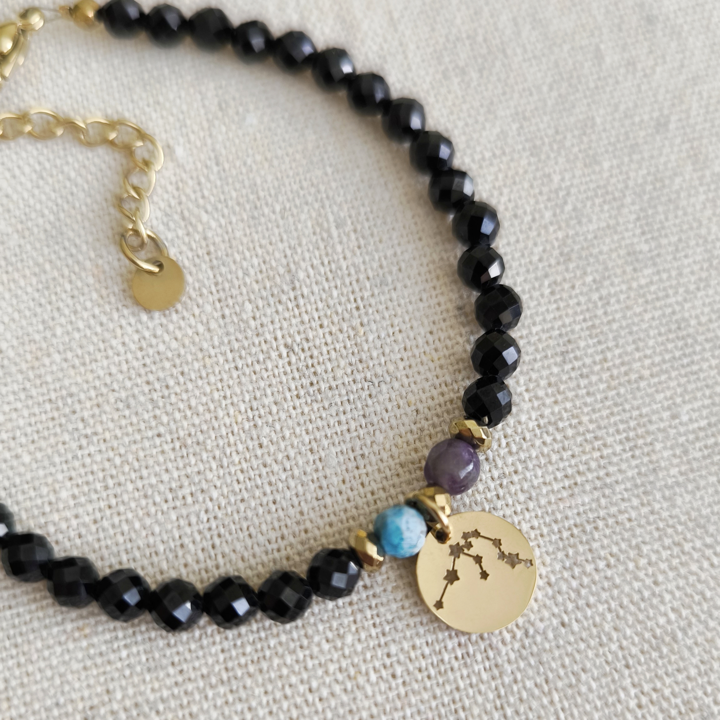 Bransoletka zodiakalna z zawieszką WODNIK